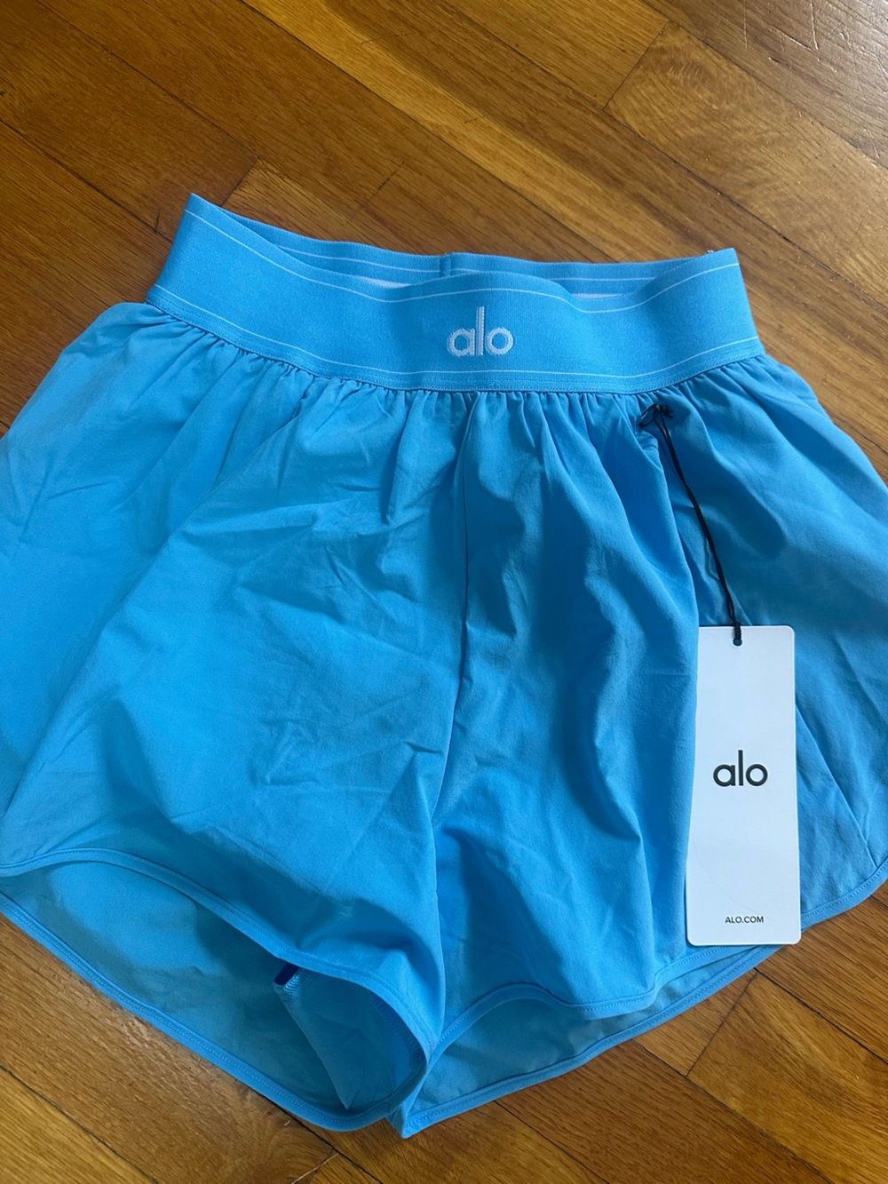 ALO Yoga azure Blue match point Shorts, size XS brand new with tags.